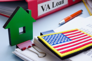 VA construction loan concept showing custom home build plans, U.S. flag